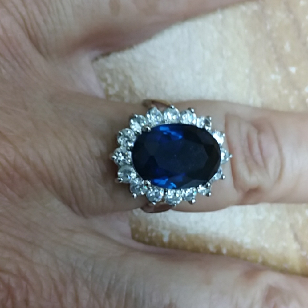 Ring with blue stone cubic zirconia
